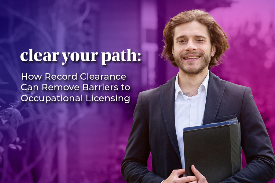 A smiling man in professional attire holds a folder, standing outdoors against a blurred, purple-toned background. Text reads "Clear your path: How Record Clearance Can Remove Barriers to Occupational Licensing," promoting the theme of overcoming obstacles for career advancement.